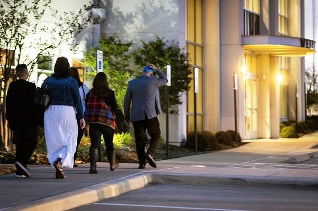 FILE - Community members arrive for a healing service for Congregation Beth Israel following Saturday's hostage standoff at the Colleyville, Texas, synagogue, at White's Chapel United Methodist Church in Southlake, Texas on Monday Jan. 17, 2022. (Yffy Yossifor/Star-Telegram via AP, File)
