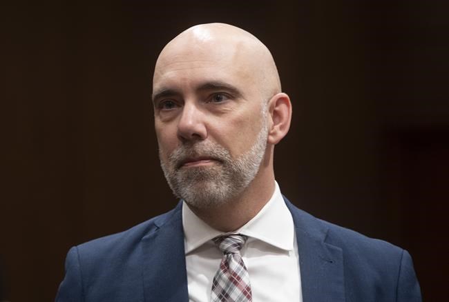 Parliamentary Budget Officer Yves Giroux waits to appear before the Commons Finance committee on Parliament Hill in Ottawa on March 10, 2020. THE CANADIAN PRESS/Adrian Wyld