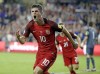 FILE - United States' Christian Pulisic (10) celebrates after scoring a goal against Panama during the first half of a World Cup qualifying soccer match, Friday, Oct. 6, 2017, in Orlando, Fla. The United States will play its final home World Cup qualifier at Orlando, Florida, on March 27 against Panama. The U.S. Soccer Federation announced Wednesday, Jan. 19, 2022, that the match will be at Exploria Stadium, where the Americans beat Panama 4-0 on Oct. 6, 2017, also their next-to-last qualifier.(AP Photo/John Raoux, File)