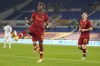 Roma's Tammy Abraham, left, celebrates after scoring during the Italian Cup soccer match between Roma and Lecce at Rome's Olympic stadium, Thursday, Jan. 20, 2022. (AP Photo/Alessandra Tarantino)
