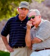 FILE - Jay Haas, left, talks to 1968 Masters champion Bob Goalby on the fifth hole at Indian Wells Country Club during the third round of the Bob Hope Chrysler Classic golf tournament Jan. 31, 2003, in Indian Wells, Calif. Goalby is also Haas' uncle. Goalby has died. His death Wednesday, Jan. 19, 2022, in his hometown of Belleville, Ill., was confirmed by the PGA Tour and Bill Haas, his great nephew. Goalby was 92. (AP Photo/Mark J. Terrill, File)