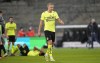 Dortmund's Erling Haaland leaves the pitch disappointed after losing the German Soccer Cup round of 16 match between FC St. Pauli and Borussia Dortmund in Hamburg, Germany, Tuesday, Jan. 18, 2022. (AP Photo/Martin Meissner)