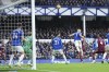 Aston Villa's Emiliano Buendia, second from right, scores his side's first goal during the English Premier League soccer match between Everton and Aston Villa at the Goodison Park stadium, in Liverpool, England, Saturday Jan. 22, 2022. (AP Photo/Jon Super)