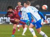 Bayern's Leroy Sane, left, shoots on goal during the German Bundesliga soccer match between Hertha Berlin and Bayern Munich at the Olympiastadion in Berlin, Sunday, Jan. 23, 2022. (Soeren Stache/dpa via AP)