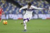 Fiorentina's Dusan Vlahovic fires a shot during the Italian Cup, round of 16 soccer match between Napoli and Fiorentina, at the Diego Armando Maradona stadium in Naples, Italy, Thursday, Jan. 13, 2022. (Alessandro Garofalo/LaPresse via AP)
