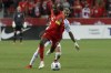 Canada's captain Atiba Hutchinson (left) gets away from Honduras' Kervin Arriaga during second half World Cup qualifying action in Toronto on Sept. 2, 2021. The Canadian men face a challenging schedule with three matches in three countries across seven days, starting Thursday in Honduras. THE CANADIAN PRESS/Chris Young