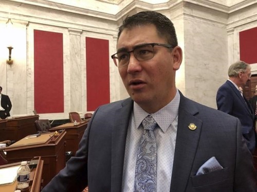FILE - West Virginia Senate Majority Leader Tom Takubo, a Kanawha County Republican, listens to a colleague before the start of the 2020 regular legislative session Wednesday, Jan. 8, 2020, in Charleston, W.Va. Signaling an eagerness to diversify its energy offerings, coal-dependent West Virginia would eliminate a ban on nuclear power plants under a bill that passed the state Senate. The bill was approved on a 24-7 vote Tuesday, Jan. 25, ,2022. (AP Photo/John Raby, File)