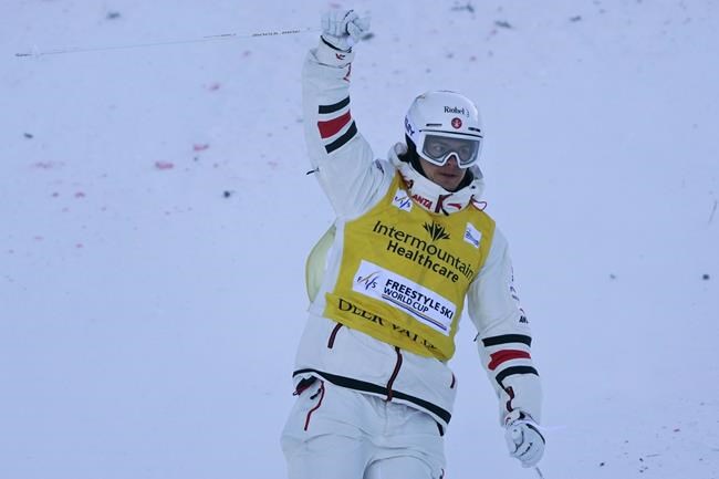 Canada's Mikael Kingsbury celebrates after finishing a run in the finals of a World Cup freestyle moguls competition at Deer Valley Resort in Park City, Utah, Friday, Jan. 14, 2022. THE CANADIAN PRESS/AP, Rick Bowmer