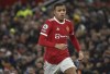 FILE- Manchester United's Mason Greenwood runs during the English Premier League soccer match between Manchester United and Burnley at Old Trafford in Manchester, England, Thursday, Dec. 30, 2021. Manchester United says forward Mason Greenwood will not play or practice with the club until further notice after being accused of sexual assault by a woman, with police also looking into the incident. The statement from the Premier League club was issued on Sunday, Jan. 30, 2022 in response to allegations being posted within videos, photographs and an audio recording that are no longer visible on a woman’s Instagram account. (AP Photo/Rui Vieira, File)