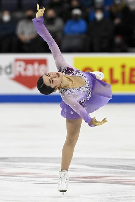 Karen Chen competes in the women's free skate program during the U.S. Figure Skating Championships Friday, Jan. 7, 2022, in Nashville, Tenn. (AP Photo/Mark Zaleski)