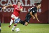Pacific FC's Alessandro Hojabrpour, right, collides with Cavalry FC's Nik Ledgerwood during second half soccer action in the Canadian Championship quarterfinal in Calgary, Alta., Wednesday, Sept. 22, 2021.&nbsp;The 37-year-old from Lethbridge, Alta.,has announced his retirement. THE CANADIAN PRESS/Jeff McIntosh