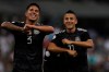 Mexico's Roberto Alvarado, right, celebrates scoring his side's first goal against Panama with teammate Carlos Salcedo during a CONCACAF Nations League soccer match at Azteca stadium in Mexico City, Tuesday, Oct 15, 2019. Toronto FC has confirmed the acquisition of Mexican international defender Carlos Salcedo from Mexico's Tigres UANL as a designated player through 2024. (AP Photo/Fernando Llano)