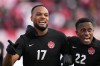 Canada's Cyle Larin, 17, celebrates his goal against the USA with teammate Richie Laryea, 22, during a men's first half World Cup Qualifier at Tim Hortons Field in Hamilton, Ont. on Sunday Jan. 30, 2022.&nbsp;Canada looks to extend its unbeaten run in CONCACAF World Cup qualifying when it visits El Salvador on Wednesday.THE CANADIAN PRESS/Nathan Denette