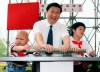 FILE - Xi Jinping, then Shanghai's Communist Party chief, attends a ceremony to launch the countdown clock for the Shanghai Special Olympic Games in Shanghai, China, on June 24, 2007. The Chinese president, hosting the 2022 Winter Olympics beleaguered by complaints about human rights abuses, has upended tradition to restore strongman rule in China and tighten Communist Party control over the economy and society. (AP Photo, File)