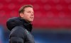 FILE - Wolfsburg's coach Florian Kohfeldt stands in the stadium before the Bundesliga soccer match between RB Leipzig and VfL Wolfsburg in Leipzig, Germany, on Jan. 23, 2022. Wolfsburg is banking on a victory against last-place Greuther Fürth on Sunday after failing to win any of its last nine Bundesliga games. Anything less could spell the end for coach Florian Kohfeldt and leave Wolfsburg contemplating relegation in a season that started with Champions League soccer. (Jan Woitas/dpa via AP)