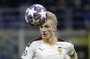 Valencia's Daniel Wass controls the ball during the Champions League round of 16, first leg, soccer match between Atalanta and Valencia at the San Siro stadium in Milan, Italy, Wednesday, Feb. 19, 2020. Barcelona’s revamped attack will host an Atlético Madrid side seeking to restore its once vaunted defense on Sunday at Camp Nou. Barcelona has struggled to produce goals since the exit of Lionel Messi. So in the winter transfer window the club brought in Pierre-Emerick Aubameyang, Adama Traoré and Ferran Torres from the Premier League. Atlético also acquired versatile midfielder Daniel Wass from Valencia and left back Reinildo Mandava from Lille. (AP Photo/Luca Bruno)
