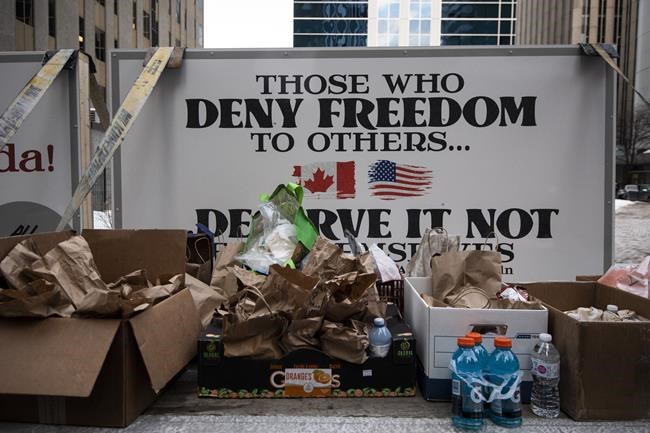 Food provisions are seen on the back of a flatbed truck parked on Metcalfe Street as a rally against COVID-19 restrictions, which began as a cross-country convoy protesting a federal vaccine mandate for truckers, continues in Ottawa, on Sunday, Jan. 30, 2022. A parliamentary committee has called on GoFundMe representatives to testify about how it ensures that money raised on its platform isn’t used to promote hate, such as antisemitism and white supremacy. THE CANADIAN PRESS/Justin Tang
