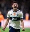 Vancouver Whitecaps' Brian White celebrates his third goal against the San Jose Earthquakes during the second half of an MLS soccer game in Vancouver, on Saturday, October 2, 2021. THE CANADIAN PRESS/Darryl Dyck