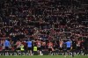 Athletic Bilbao players celebrate their victory over Real Madrid at the end of the Spanish Copa del Rey quarter final soccer match between Athletic Bilbao and Real Madrid at the San Mames stadium in Bilbao, Spain, Thursday, Feb. 3, 2022. (AP Photo/Alvaro Barrientos)