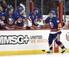FILE- New York Islanders center Josh Ho-Sang (66) celebrates his goal against the Philadelphia Flyers with teammates in the third period of a preseason NHL hockey game in New York., Monday, Sept. 26, 2016. The 2022 Beijing Olympics will be the first time Josh Ho-Sang, the multirracial, multicultural Canadian ice hockey player, will visit China. 