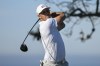 Bryson DeChambeau hits his tee shot on the 11th hole of the North Course at Torrey Pines during the first round of the Farmers Insurance Open golf tournament, Wednesday Jan. 26, 2022, in San Diego. (AP Photo/Denis Poroy)
