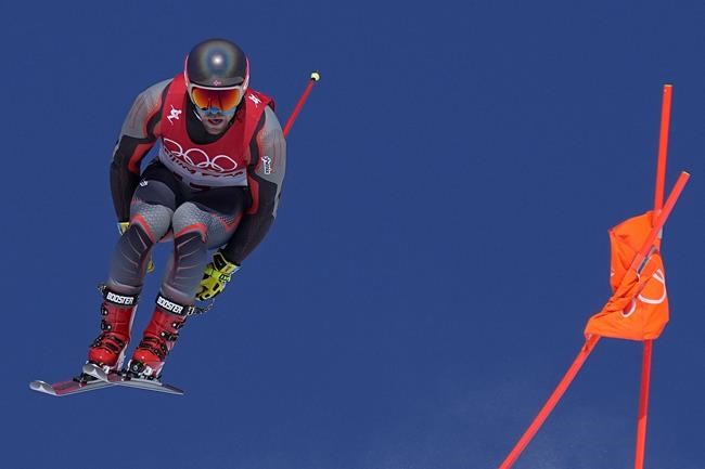 Aleksander Aamodt Kilde of Norway makes a jump during men's downhill training at the 2022 Winter Olympics, Friday, Feb. 4, 2022, in the Yanqing district of Beijing. (AP Photo/Robert F. Bukaty)