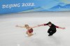 Alexa Knierim and Brandon Frazier, of the United States, compete during the pairs short program figure skating competition at the 2022 Winter Olympics, Friday, Feb. 4, 2022, in Beijing. (AP Photo/Jeff Roberson)
