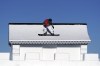 An Australian skateboarder trains on the slopestyle course ahead of ahead of the 2022 Winter Olympics, Wednesday, Feb. 2, 2022, in Zhangjiakou, China. (AP Photo/Gregory Bull)
