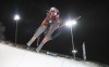 FILE - China's Ailing Eileen Gu competes during the women's World Cup freestyle ski halfpipe event in Calgary, Alberta., Dec. 30, 2021. American-born daredevil Gu will be trying to win gold medals for China at the Beijing Games. Gu's mother is from the host country and the 18-year-old freestyle skier made the decision to compete for China instead of the United States. (Jeff McIntosh/The Canadian Press via AP, File)