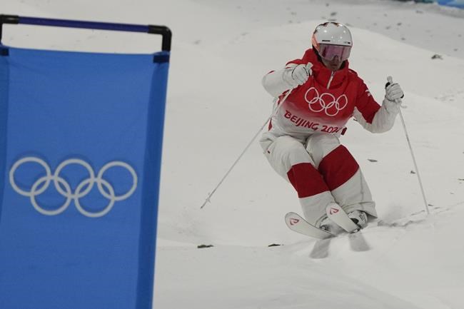 Canada's Mikael Kingsbury competes in the men's moguls qualifying at Genting Snow Park at the 2022 Winter Olympics, Thursday, Feb. 3, 2022, in Zhangjiakou, China. (AP Photo/Lee Jin-man)