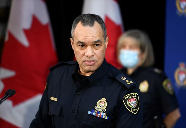 Ottawa Police Chief Peter Sloly listens to a question at a news conference on updated enforcement measures as a protest against COVID-19 restrictions continues into its second week, in Ottawa, on Friday, Feb. 4, 2022. THE CANADIAN PRESS/Justin Tang