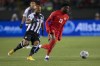 Team Canada's Alphonso Davies (19) is chased by Costa Rica's Celso Borges Mora (5) during second half World Cup qualifier soccer action in Edmonton on Nov. 12, 2021. Davies and fellow Canadians Jonathan David, Jessie Fleming, Stephanie Labbe and Christine Sinclair are up for CONCACAF Player of the Year. THE CANADIAN PRESS/Jason Franson
