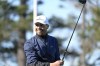 Mookie Betts smile after hitting from the 10th tee of the Spyglass Hill Golf Course during the second round of the AT&T Pebble Beach Pro-Am golf tournament in Pebble Beach, Calif., Friday, Feb. 4, 2022. (AP Photo/Tony Avelar)