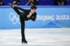 Nathan Chen, of the United States, competes during the men's singles short program team event in the figure skating competition at the 2022 Winter Olympics, Friday, Feb. 4, 2022, in Beijing. (AP Photo/Bernat Armangue)