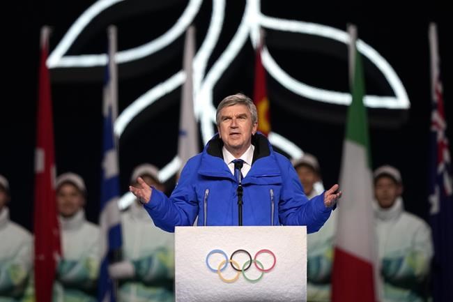 President of the International Olympic Committee, Thomas Bach, speaks during the opening ceremony of the 2022 Winter Olympics, Friday, Feb. 4, 2022, in Beijing. (AP Photo/David J. Phillip)