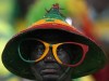 A Senegal supporter prior to the start of the African Cup of Nations 2022 semifinal soccer match between Burkina Faso and Senegal at the Ahmadou Ahidjo stadium in Yaounde, Cameroon, Wednesday, Feb. 2, 2022. (AP Photo/Themba Hadebe)