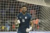 Egypt's goalkeeper Mohamed Abou Gabal reacts after saving a penalty during the penalty shootout during the African Cup of Nations 2022 semi-final soccer match between Cameroon and Egypt at the Olembe stadium in Yaounde, Cameroon, Thursday, Feb. 3, 2022. (AP Photo/Sunday Alamba)