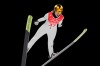 Nika Kriznar, of Slovenia, soars through the air during the women's normal hill individual ski jumping trial round at the 2022 Winter Olympics, Saturday, Feb. 5, 2022, in Zhangjiakou, China. (AP Photo/Andrew Medichini)