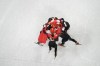 Skaters from China hug in celebration after winning the final to earn a gold medal in the mixed relay short track speedskating competition at the 2022 Winter Olympics, Saturday, Feb. 5, 2022, in Beijing. (AP Photo/Jeff Roberson)