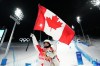 Mikael Kingsbury, of Canada, celebrates his silver medal winning run at men's moguls finals at the 2022 Winter Olympics in Zhangjiakou, China on Saturday, February 5, 2022. THE CANADIAN PRESS/Sean Kilpatrick