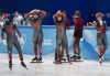 Canadas Steven Dubois, left, Jordan Pierre-Gilles, second left, Kim Boutin, second right, Florence Brunelle, right, react after finishing fourth in the mixed team relay speed skating final Saturday, February 5, 2022 at the 2022 Winter Olympics in Beijing. THE CANADIAN PRESS/Ryan Remiorz