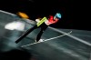 Yuki Ito, of Japan, soars through the air during the women's normal hill individual first round at the 2022 Winter Olympics, Saturday, Feb. 5, 2022, in Zhangjiakou, China. (AP Photo/Matthias Schrader)