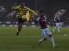 Watford's Samir, left and Burnley's Maxwel Cornet battle for the ball, during the English Premier League soccer match between Burnley and Watford, at Turf Moor, in Burnley, England, Saturday, Feb. 5, 2022. (Ian Hodgson/PA via AP)