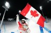 Mikael Kingsbury, of Canada, celebrates his silver medal winning run at men's moguls finals at the 2022 Winter Olympics in Zhangjiakou, China on Saturday, February 5, 2022. THE CANADIAN PRESS/Sean Kilpatrick