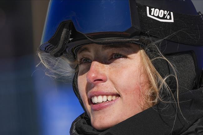 New Zealand'S Zoi Sadowski Synnott competes during the women's slopestyle qualifying at the 2022 Winter Olympics, Saturday, Feb. 5, 2022, in Zhangjiakou, China. (AP Photo/Francisco Seco)