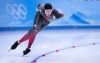 Canada's Ted-Jan Bloeman powers around the oval in the men's 5,000 metre speedskating race at the 2022 Winter Olympics in Beijing on Sunday, February 6, 2022. THE CANADIAN PRESS/Paul Chiasson