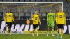 Dortmund's Manuel Akanji, Dortmund's Marco Reus. Dortmund's goalkeeper Gregor Kobel and Dortmund's Julian Brandt, from left, look disappointed after receiving goal number 4 during the German Bundesliga soccer match between Borussia Dortmund and Bayer Leverkusen in Dortmund, Germany, Sunday, Feb. 6, 2022. (AP Photo/Martin Meissner)