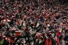 Athletic Bilbao supporter celebrate their team victory over Real Madrid after the Spanish Copa del Rey quarter final soccer match between Athletic Bilbao and Real Madrid at the San Mames stadium in Bilbao, Spain, Thursday, Feb. 3, 2022. (AP Photo/Alvaro Barrientos)