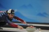 Christopher Plys, of the United States, throws a rock during the mixed doubles curling match against at the Beijing Winter Olympics Monday, Feb. 7, 2022, in Beijing. (AP Photo/Brynn Anderson)