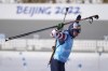 A member of the United States team leaves the target shooting area during practice at the 2022 Winter Olympics, Sunday, Feb. 6, 2022, in Zhangjiakou, China. (AP Photo/Kirsty Wigglesworth)